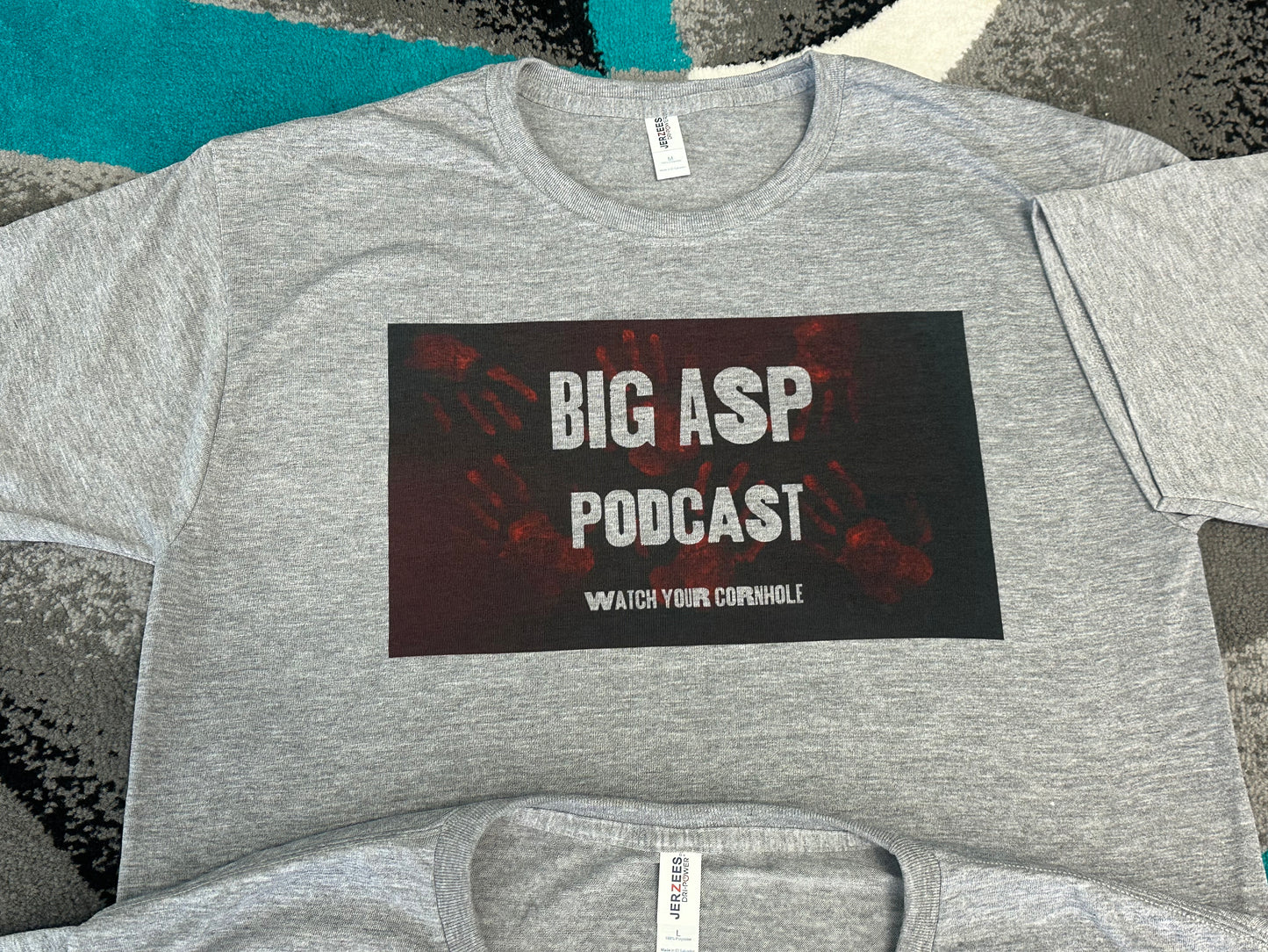 (NEW)Big Asp Podcast Watch Your Cornhole Performance Soft Tee